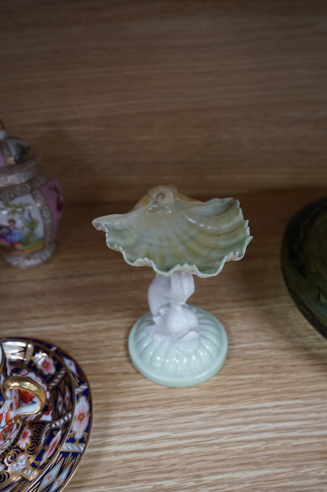A Worcester butterfly handled cup and saucer and four other items, together with Royal Crown Derby, Dresden and Coalport items. (9). Tallest 13 cm